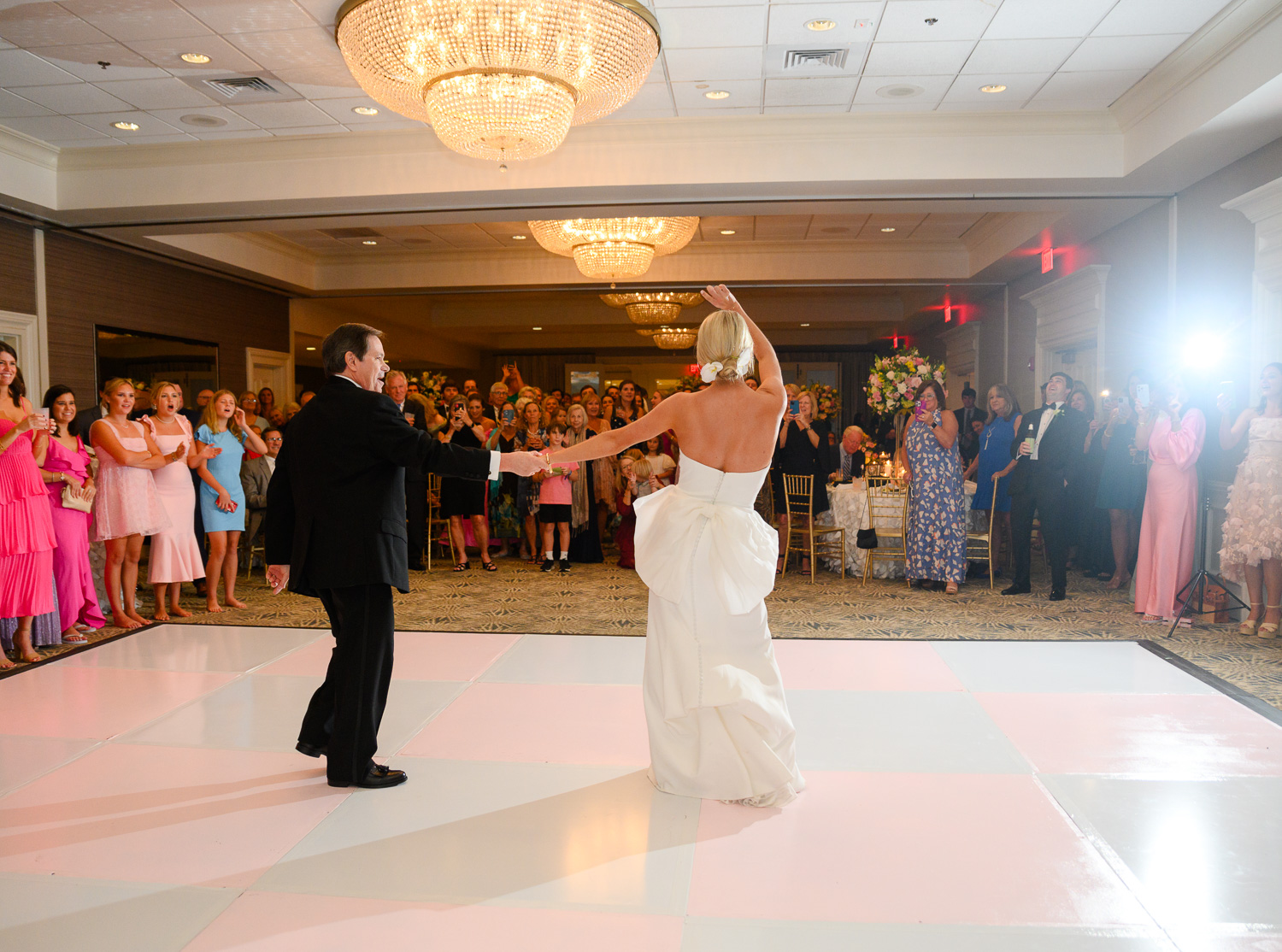 a moment for the pink and white custom dance floor